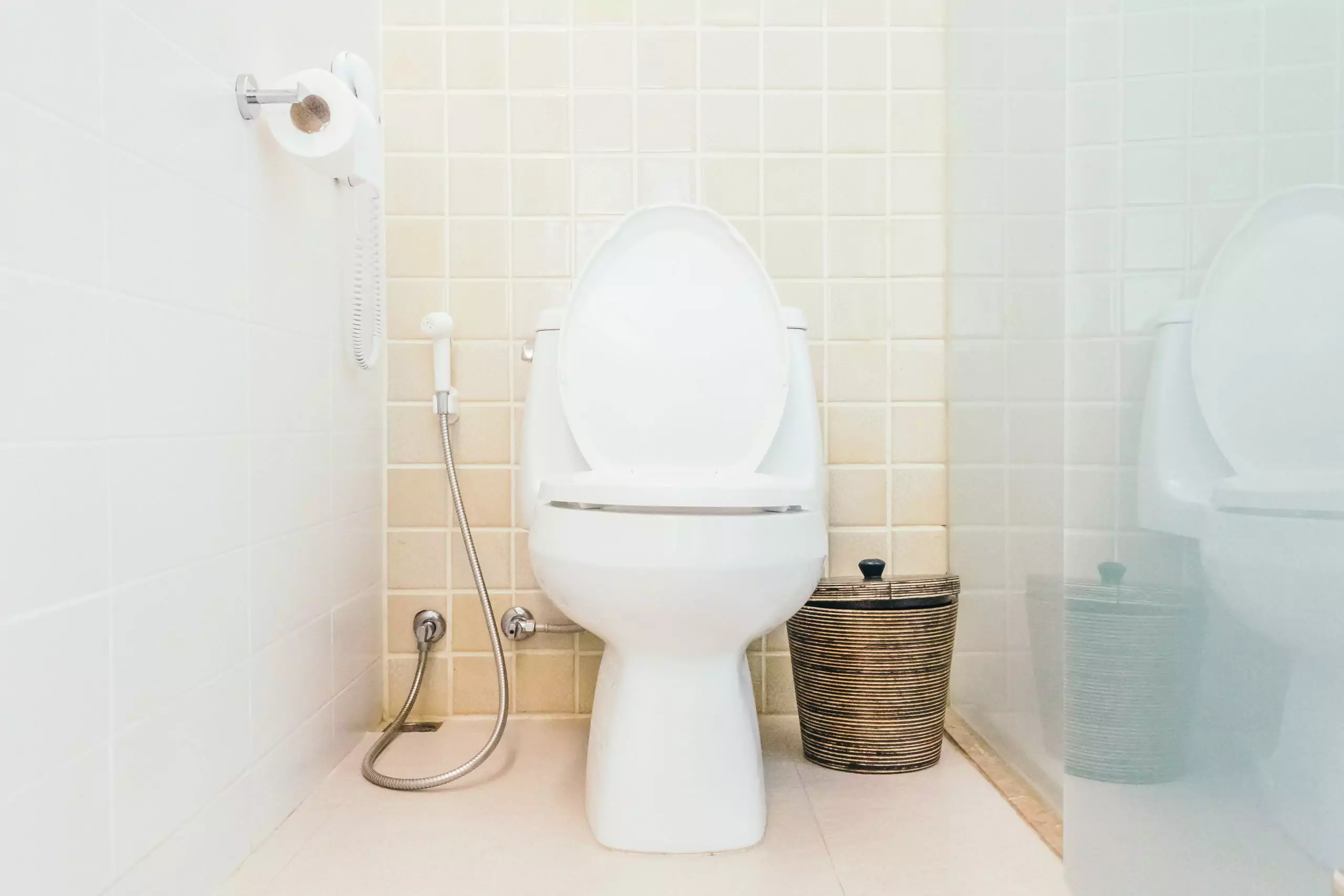 Toilet in bathroom for urinary or urination issues