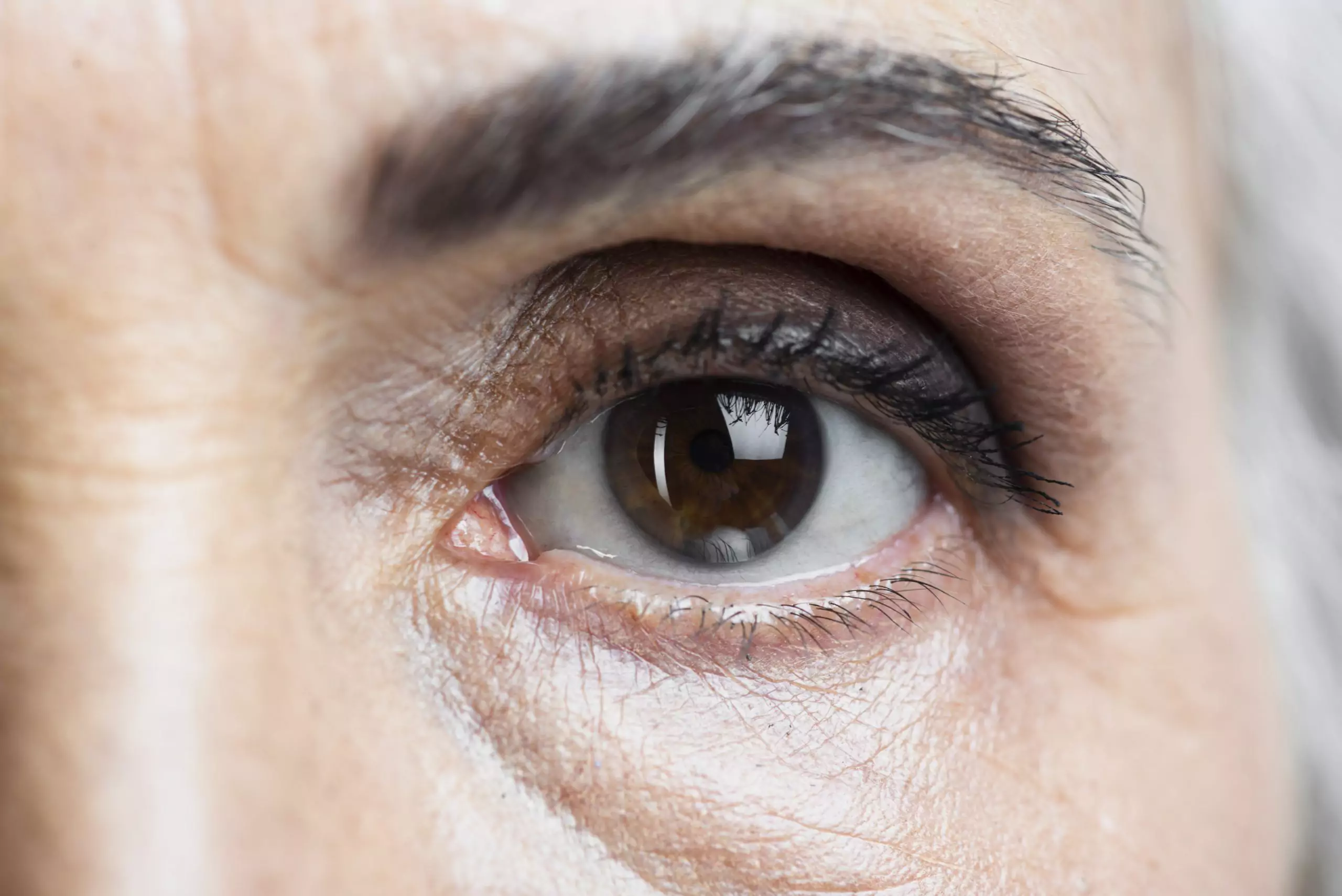 Close-up of an older woman's eye for a glaucoma test