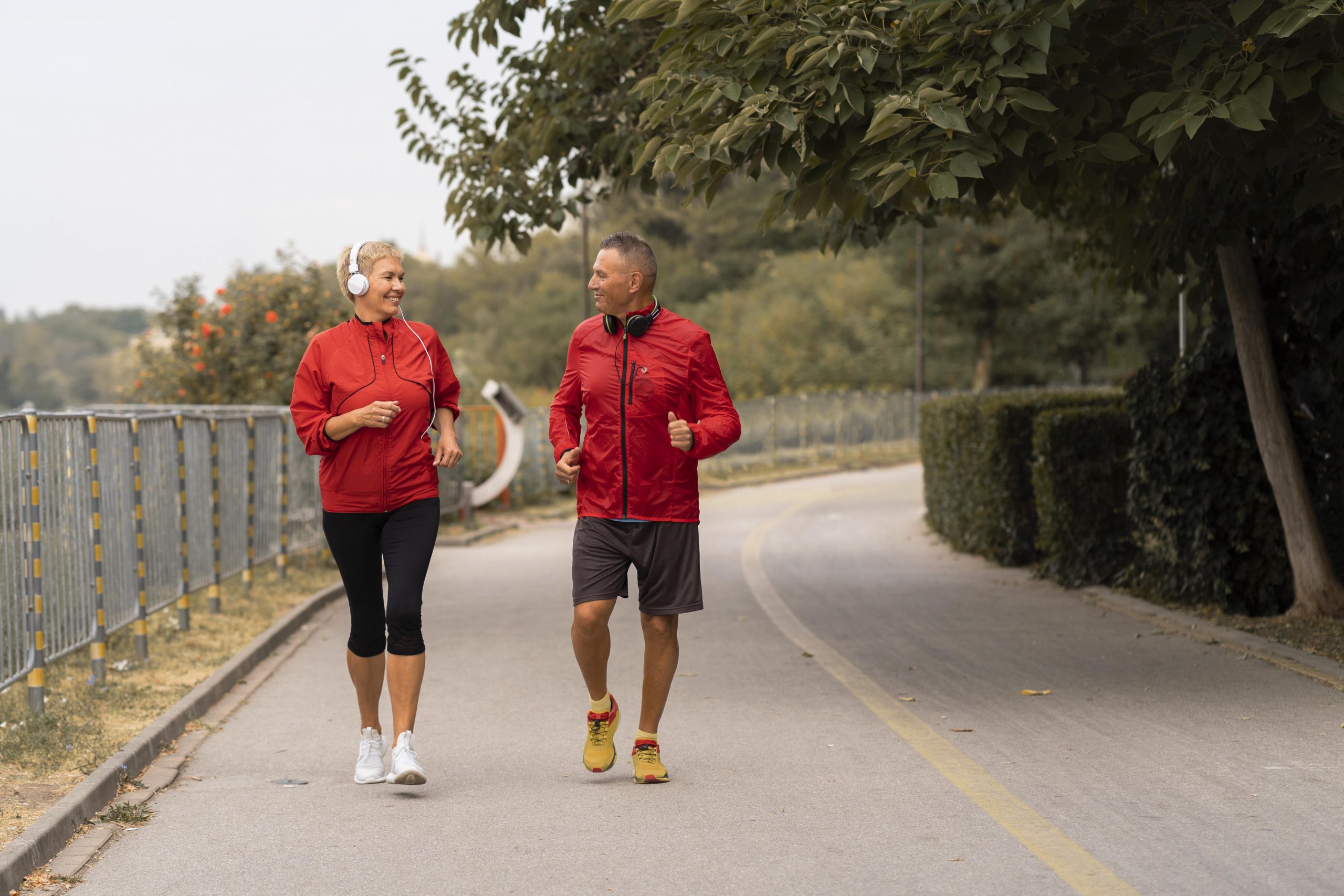 Older couple exercising outside